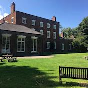 Back of house and lawn - Trafford Hall